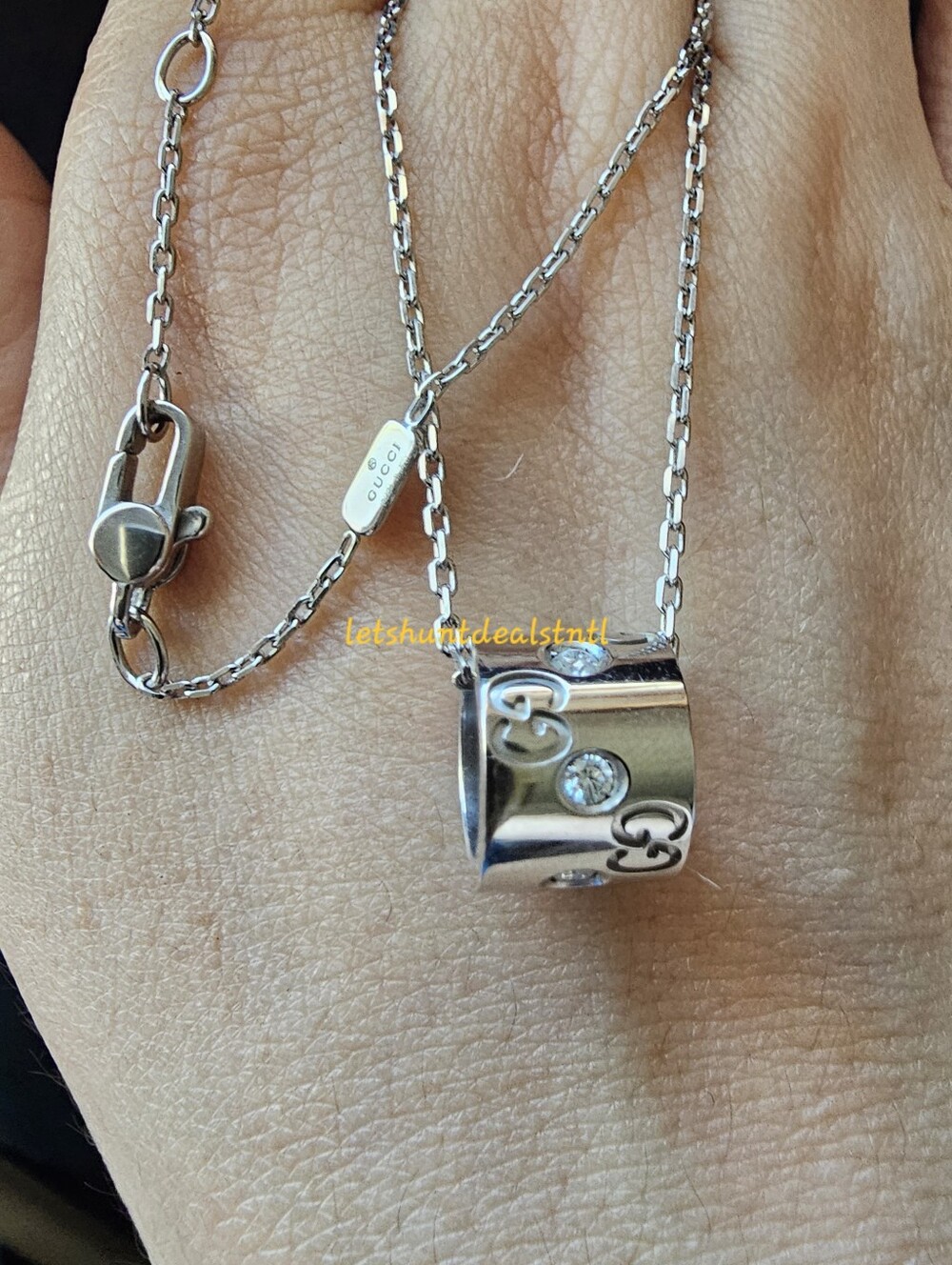 Gucci 18k White Gold Twirl Diamond Set Pendant. 16 INCHES.